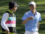 Anthony Kim with Y. E. Yang at Sherwood